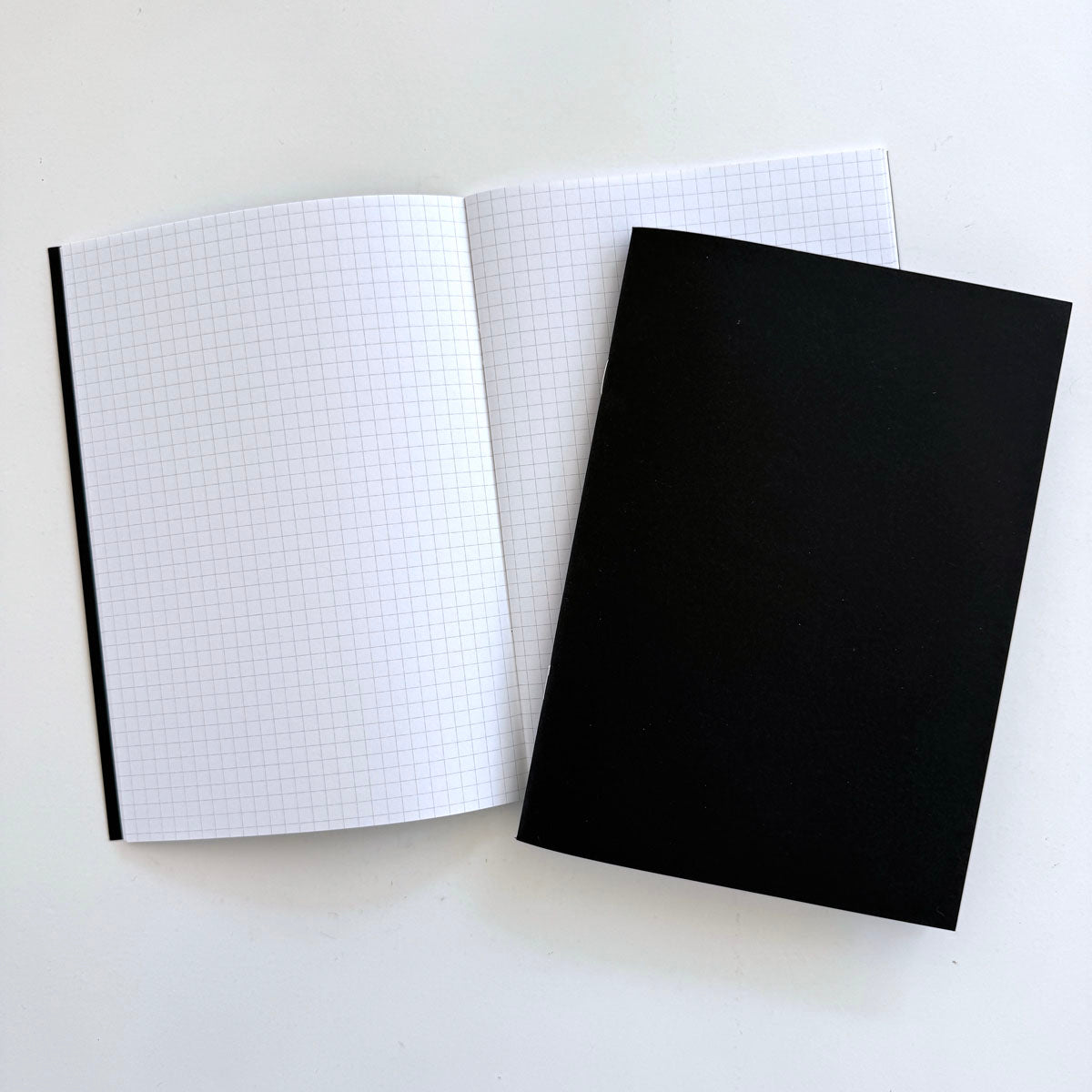 A5_plain_notebook_with_staples_1.jpg