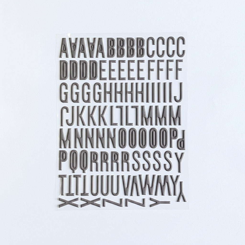 Booked For Spring Black Puffy Alpha Stickers - April 2026